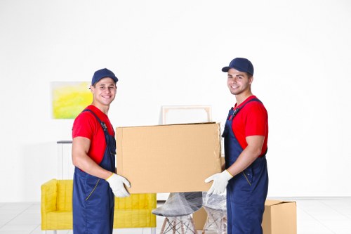 A small removals van handling a local move in Belsizepark