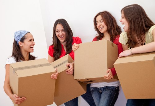 Office removals planning in Belsize Park with moving boxes and desks