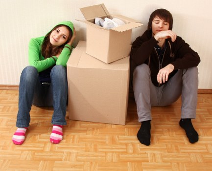 Experienced movers handling furniture during flat removals in Belsizepark