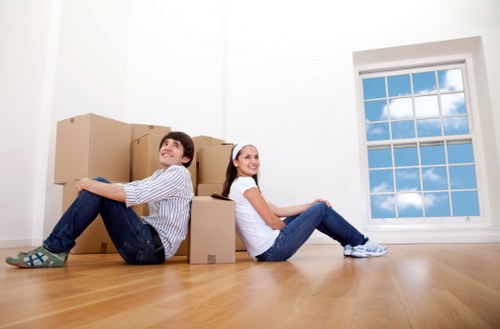 Customer placing items carefully into a storage unit