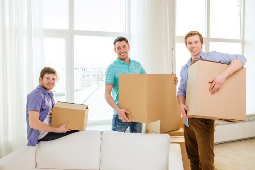 Packed boxes and furniture stored safely in a Belsizepark unit